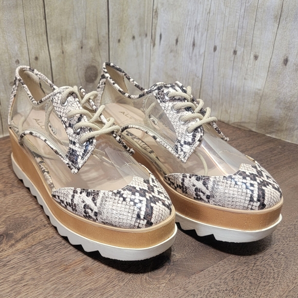 Aldo Shoes - Aldo clear/snake print platform sneakers. Size 8